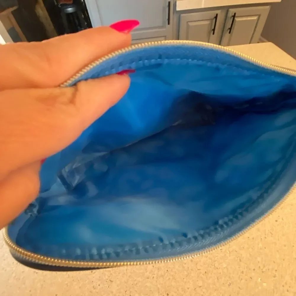 Two Estée Lauder NWOT make up bags